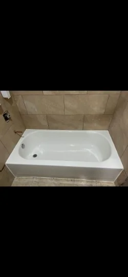 Clean white bathtub after refinishing