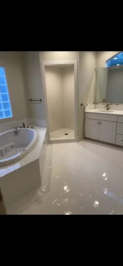 Bright unified bathroom surfaces after resurfacing